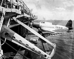 Vought SB2U-2 Vindicator dive bomber of Scouting Squadron VS-72 on the deck-edge elevator of USS Wasp (Wasp-class) at Quincy, Massachusetts, United States, Jun 1940.
