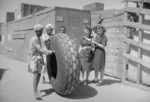 WAAF equipment assistants and Indian laborers at a Maintenance Unit in Bombay, India, 1941-1945