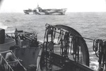 Carrier USS Ranger in her Measure 33, Design 1a paint scheme as seen from destroyer USS DeHaven as they steamed from the Panama Canal toward San Diego, California, 22 Jul 1944.