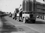 Parade of military vehicles, Ann Street, Brisbane, Queensland, Australia, 3 Jul 1942; note Diamond T tank transporters and Matilda tanks