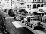 Parade of military vehicles, Queen Street, Brisbane, Queensland, Australia, circa 1943; note Diamond T tank transporters with Matilda tanks