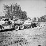 Diamond T tank transporter of 372 Tank Transporter Company of British Royal Army Service Corps towing a German PzKpfw IV tank, Italy, 1 Nov 1943