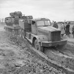 A Diamond T tank transporter carrying a Churchill tank at the British Royal Electrical and Mechanical Engineers experimental recovery section at Aborfield, Berkshire, England, United Kingdom, 7 Apr 1943