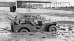 Ford Pygmy Jeep prototype being tested in the mud at Fort Holabird, Maryland, United States, Feb 1941.