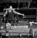Male worker at the Small Arms Ltd. plant, Mississauga, Ontario, Canada, date unknown