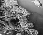 Aerial view of the Marinship Shipbuilding yard, Sausalito, California, United States, 6 Dec 1944. Note the six tankers under construction on the ways and six others being fitted out at the piers. Photo 2 of 5.