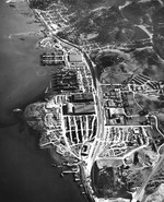Aerial view of the Marinship Shipbuilding yard, Sausalito, California, United States, 6 Dec 1944. Note the six tankers under construction on the ways and six others being fitted out at the piers. Photo 3 of 5.