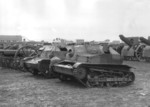 Polish TKS tankette (foreground), TK-3 tankette (behind TKS), 155 mm haubica wz. 1917 howitzers (right of photo), and another type of field guns (left of photo) captured by German forces, Poland, late Sep 1939