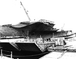 The hulk of the former aircraft carrier Ticonderoga being dismantled at Tacoma, Washington, United States, 1975.