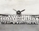 Officers and men of Torpedo Squadron VT-27 upon the completion of their training at Kahului Naval Air Station, Maui, Hawaii, Apr 1944. Note TBM-1C Avenger torpedo bomber.