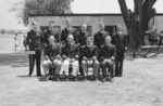 Group portrait of the officers of sunken German auxiliary cruiser Kormoran, HM Prison Dhurringile, Victoria, Australia, 11 Feb 1943; commanding officer Theodor Detmers in front row, second from the right
