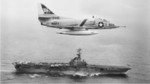 A-4C Skyhawk aircraft of VA-46 squadron flying over USS Shangri-La, Feb-Aug 1962; seen in Nov 1965 edition of US Navy publication Naval Aviation News