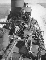 Demolished No. 3 5-inch gun mount aboard USS Nicholas shortly after 13 May 1943. During an early morning shore bombardment, the gun suffered a hang fire and the hot gun set off the shell inside the barrel. No casualties