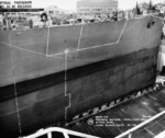 The new bow section of the cruiser USS St. Louis, 1 Oct 1943, Mare Island Naval Shipyard, Vallejo, California, United States. The white lines mark the areas of new construction. Photo 2 of 2.