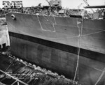 The new bow section of the cruiser USS St. Louis, 1 Oct 1943, Mare Island Naval Shipyard, Vallejo, California, United States. The white lines mark the areas of new construction. Photo 1 of 2.