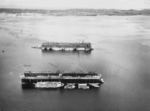 Advanced Base Sectional Dock #2 (foreground) and ABSD #4 at Papitalai Harbor (a sheltered bay in Seeadler Harbor), Manus, Admiralty Islands, 18 Sep 1945.
