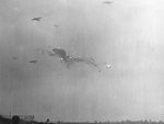 Photograph taken moments after a mid-air collision between two B-17 Fortress bombers over the airfield at RAF Thurleigh, Bedfordshire, England, 22 Oct 1944.