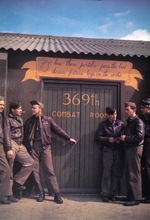 United States Army Airmen waiting outside the combat room for the 369th Bomb Squadron of the 306th Bomb Group at RAF Thurleigh, Bedfordshire, England, United Kingdom, 1945.