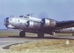 Movie still of a B-17G Fortress with the 92nd Bomb Group flying from RAF Podington in Bedfordshire, England fitted with two Disney Bombs in underwing bomb racks, Feb 1945. Photo 1 of 2.