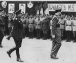 King Mihai I of Romania and commanding officer of Tudor Vladimirescu Division General Nicolae Cambrea reviewing troops of the Tudor Vladimirescu Division, Bucharest, late Aug 1944