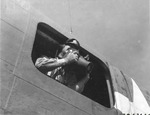 Aerial photographer United States Army Captain Russell Lee posing with his Fairchild K-20 aerial camera.