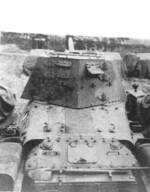 Back of the superstructure of a Type 3 Ho-Ni III tank destoyer with its top hatch and rear double hatches closed, 1945