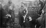 Master Sergeant Roddie Edmonds (center) with other soldiers in the field, 1944, location uncertain.