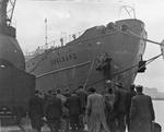 Displaced persons boarding merchant ship Svalbard at Genoa, Italy, Dec 1948; many of these passengers would later be disembarking in Australia