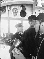 Isoroku Yamamoto, Matome Ugaki (face partially covered), and an unidentified officer on the bridge of Nagato, Aug 1941-Feb 1942