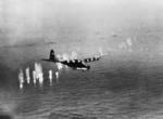 Me 323 Gigant heavy transport being shot down by a B-26 Marauder aircraft of No. 14 Squadron RAF in the Mediterranean Sea near Cap Corse, Corsica, France, 30 Jul 1943; the B-26 was piloted by Wing Commander W. S. D. Maydwell; the Me 323 would crash-land on the beach with all crew members surviving