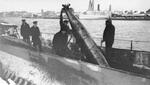 A Mark 10 torpedo being loaded onto the USS S-48, Dec 1928.