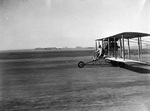 Aviator Charles Lindburgh taking off in a borrowed 1910 Curtiss pusher biplane at the 1928 National Air Races at Mines Field, Inglewood, California, 15 Sep 1928.