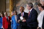 Roscoe Brown, Jr. and US President George W. Bush posing with the Congressional Gold Medal awarded to the Tuskegee Airmen, US Capitol Building, Washington DC, United States, 29 Mar 2007; Charles McGee second from left