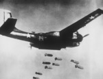 B-26C Invader aircraft of 3rd Bomb Wing of the US 5th Air Force dropping bombs over northern Korea, 1953
