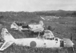Destroyed Japanese A6M Zero fighters near Lae, New Guinea, 1943