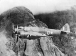 Beaufighter aircraft of No. 30 Squadron RAAF in flight over the Owen Stanley range, New Guinea, late 1942; the pilot was R. J. Brazenor with observer F. B. Anderson