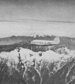 C-46 Commando aircraft flying over the Himalaya Mountains, 1943-1945