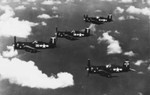 F4U-4 Corsair fighters of US Navy squadron VBF-4 in flight near Saipan, Mariana Islands, 1946-1947