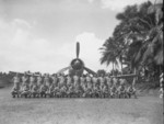 Men of US Marine Corps squadron VMF-214 posing with a F4U Corsair fighter, Turtle Bay fighter strip, Espiritu Santo, New Hebrides, circa Sep 1943