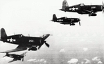 US Marine Corps F4U-1 Corsair fighters in flight, late 1943; seen in Jul-Aug 1984 issue of US Navy publication Naval Aviation News