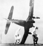F4U-4 Corsair fighter in the midst of a failed carrier landing attempt on USS Sicily, 1949; seen in Nov 1978 issue of US Navy publication Naval Aviation News