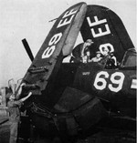 F4U Corsair fighter of US Marine Corps squadron VMF-213 being service, Marine Corps Air Station El Toro, California, United States, 1947; seen in Nov 1947 issue of US Navy publication Naval Aviation News
