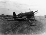 Damaged F4U-1D Corsair fighter of US Marine Corps squadron VMF-314, Ie Shima, Okinawa Prefecture, Japan, 1945