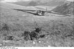 German glider trooper with K98 rifle near a landed DFS 230 C-1 glider, Gran Sasso, Italy, 12 Sep 1943