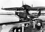 Do 18 float plane resting atop a catapult, date unknown