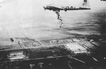 B-17G Fortress “Liquid-8-Or” of 569th Bomb Squadron dropping cases of “10 in 1” rations into Holland during Operation Chowhound aimed at breaking the famine in western Holland, May 1 or 3 1945.