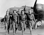 Four WASP pilots in training in front of B-17 bomber 