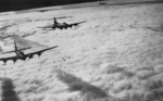 B-17F Flying Fortress bombers bombing Bremen, Germany through clouds with the aid of radar, 13 Nov 1943