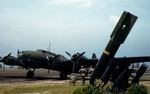 YB-17 Flying Fortress bomber at rest at Langley Field, Virginia, United States, May 1942, photo 1 of 2; note tail of two B-18 Bolo and an A-20 Havoc aircraft in background