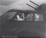 Pilot 1st Lt James M. Smith (right) and Co-Pilot 2nd Lt Fred N. Dibble in the cockpit of B-17F 